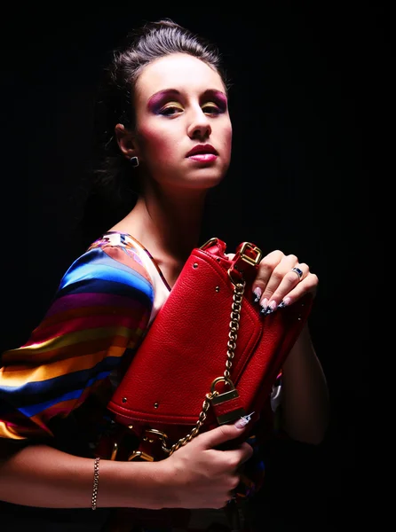 Modelo de moda con una bolsa — Foto de Stock