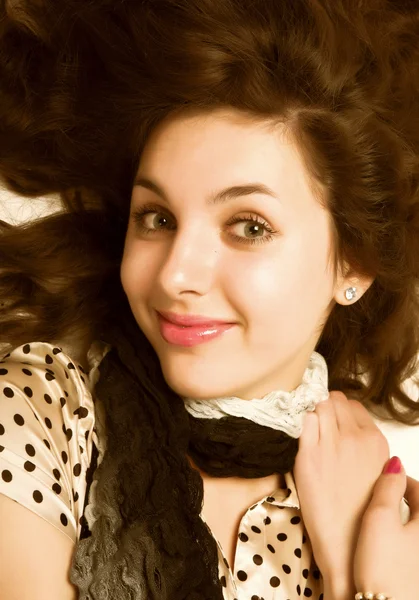 Young woman with curly hair Stock Picture