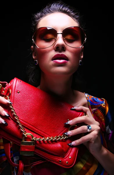 Modelo de moda com um saco — Fotografia de Stock