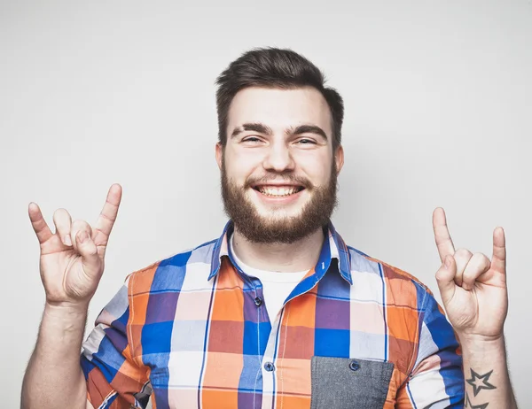 Hombre barbudo mostrando gesto pesado —  Fotos de Stock