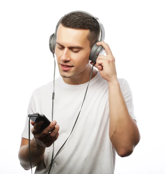 Life style and people concept:  Handsome young man in headphones — Stock Photo, Image