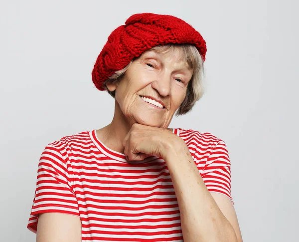 Close up portrait of happy senior woman smiling — Stock Photo, Image