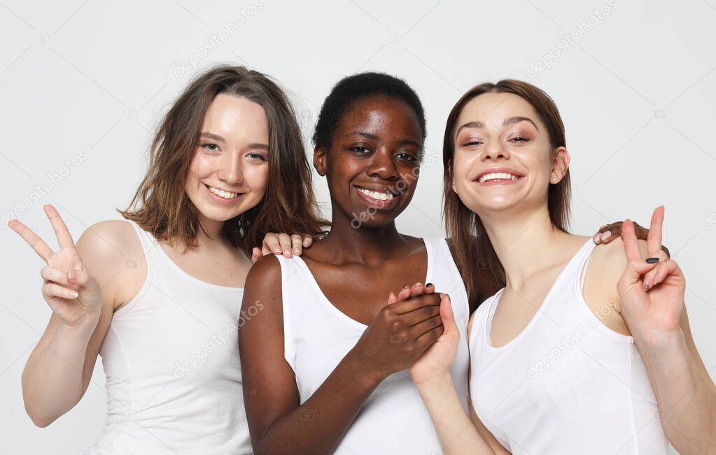 Multiethnic group of young woman isolated on white background.