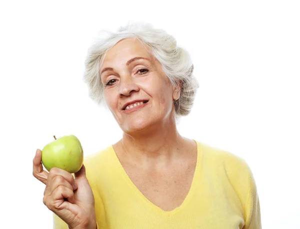 Portrait Beautiful Elderly Woman Holding Apple Smiling Isolated White Background Stock Photo