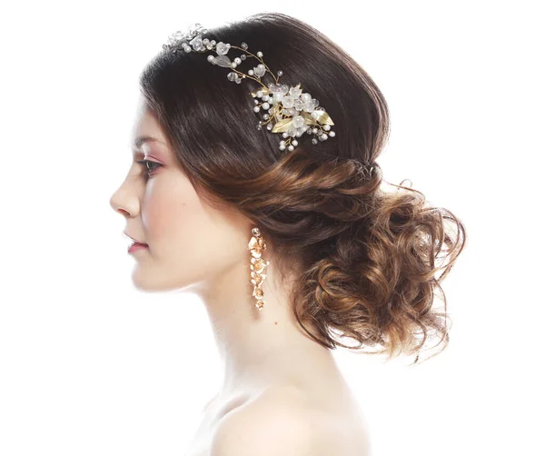 Fashionable young bride with gorgeous diadem. Studio portrait over white background. Royalty Free Stock Photos