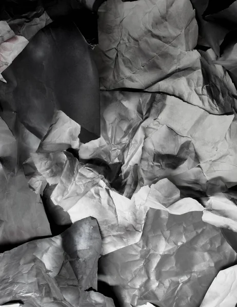 Monochrome background of torn pieces of black and white paper — Stock Photo, Image