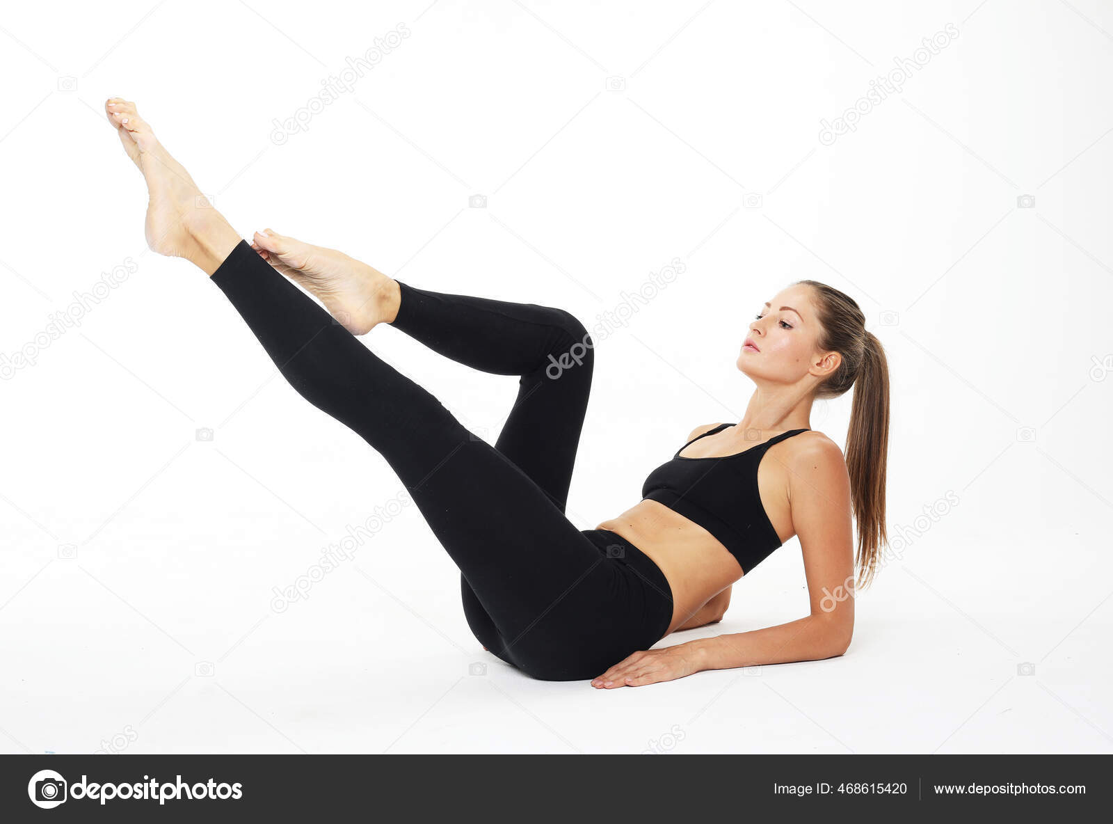 Premium Photo | Young adult slim woman practicing doing crisscross exercise  bicycle crunches pose training wearing black sports top and tights full  length studio shot illuminated by sunlight from window