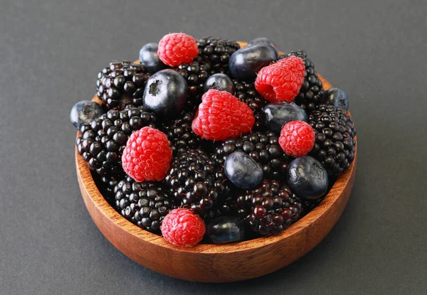 Raspberries Blackberries Blueberries Wooden Bowl Grey Background Great Breakfast Idea — Foto de Stock