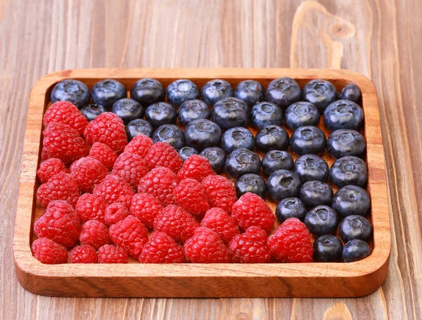 Raspberries Blueberries Wooden Square Plate Top View Close — Stock Photo, Image