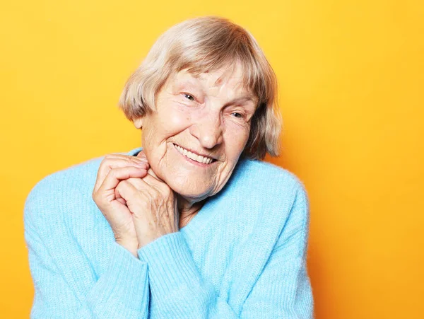 Lifestyle Emotion People Concept Funny Grandmother Wearing Blue Sweater Posing — Stock Photo, Image