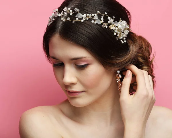 Portrait of the young bride with diadem on pink background — Stock Photo, Image