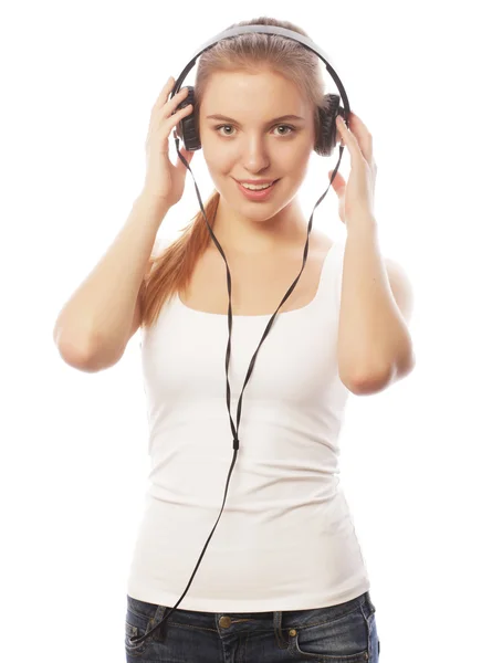 Kobieta ze słuchawkami słuchanie muzyki — Zdjęcie stockowe