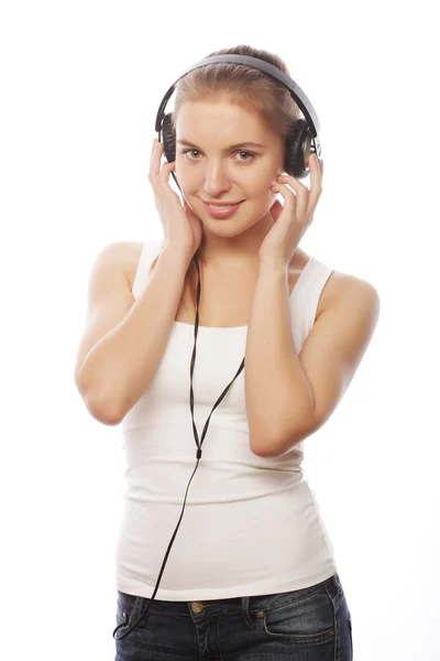 Woman with headphones listening music Royalty Free Stock Images