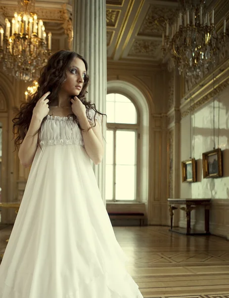 Young victorian lady in white dress — Stock Photo, Image