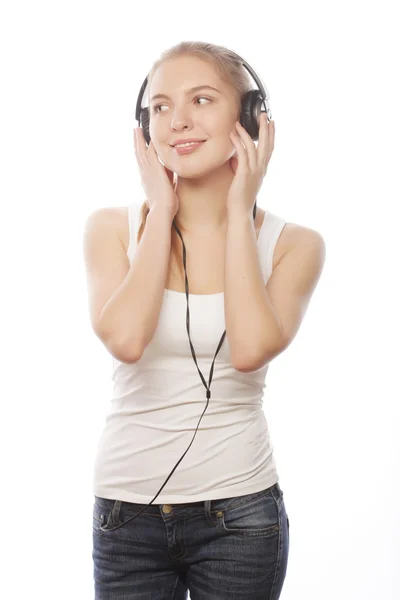 Mujer con auriculares escuchando música — Foto de Stock