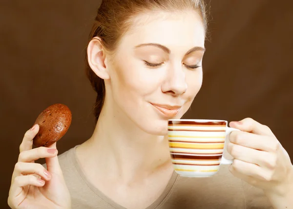 Woman with coffee and cookies — Stock Photo, Image