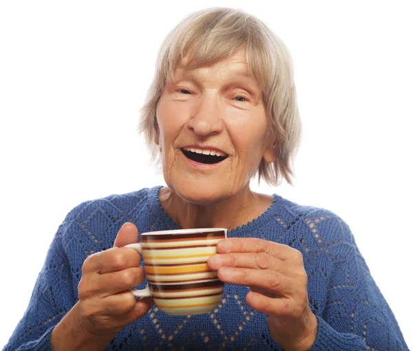 Happy old lady with coffee — Stock Photo, Image
