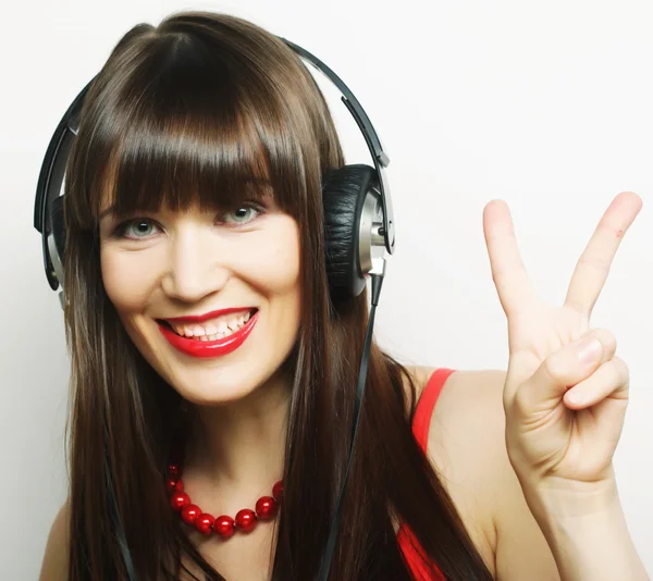 Young woman showing two fingers — Stock Photo, Image