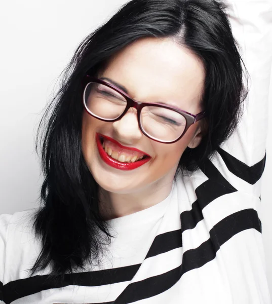 Young emotional  brunette woman wearing glasses — Stock Photo, Image