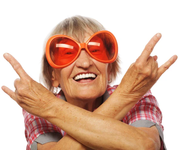 大きなサングラスをかけている年配の女性 ストックフォト