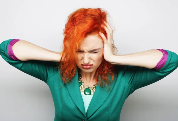 Woman with a headache holding head — Stock Photo, Image