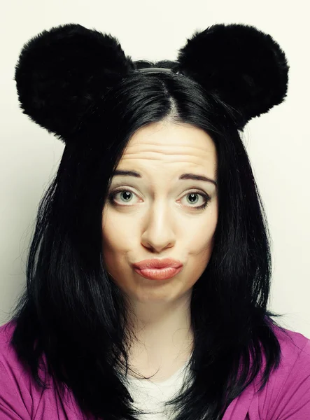 Surprised young woman with mouse ears — Stock Photo, Image