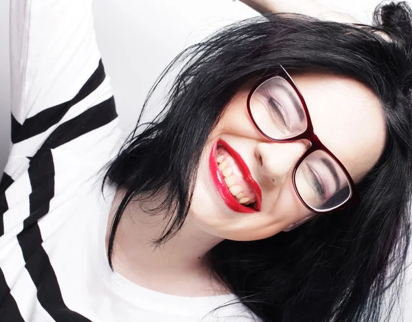 Young emotional  brunette woman wearing glasses — Stock Photo, Image