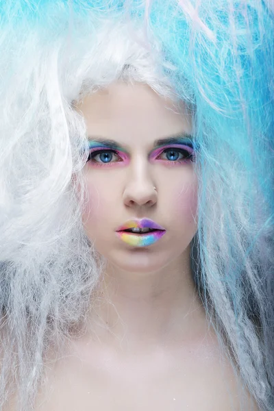 Young woman with bright make up and creative hair — Stock Photo, Image