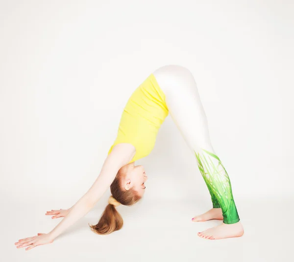 Young beautiful yoga posing — Stock Photo, Image