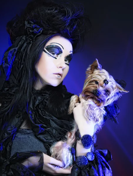 Elegant dark queen with little dog — Stock Photo, Image