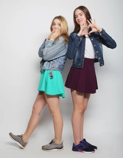 Two young girl friends having fun together. — Stock Photo, Image