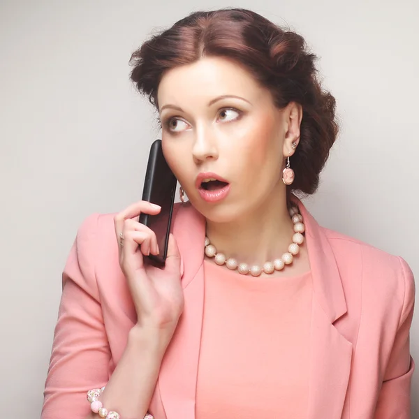 Funny businesswoman with mobile — Stock Photo, Image