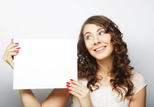 Woman holding blank card — Stock Photo, Image