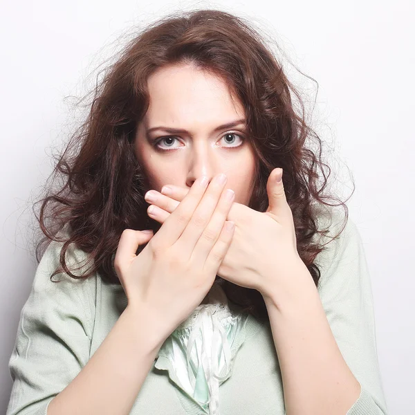 Beautiful young surprised curly woman. — Stock Photo, Image