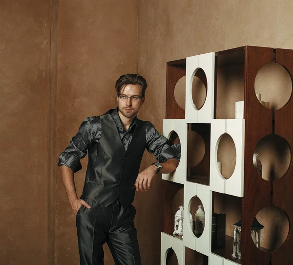 Fashion Man in luxury modern interior — Stock Photo, Image