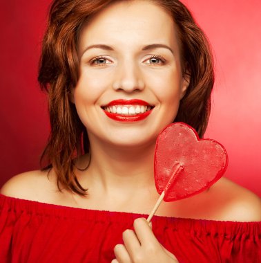 mutlu kadın kalp şeker lolly pop ile