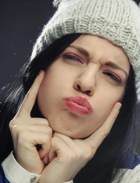 Young woman in funny winter hat — Stock Photo, Image