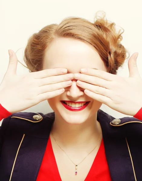 Young woman covering her eyes with her hands. — Stock Photo, Image