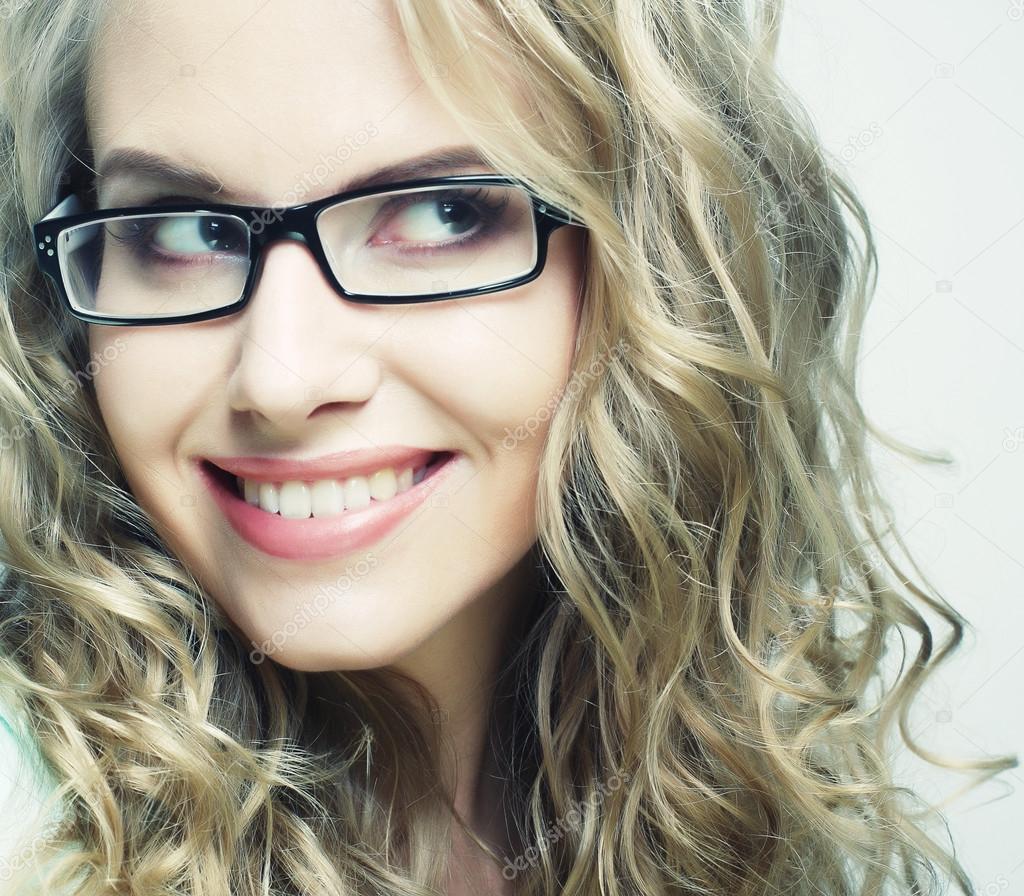 blond woman with glasses