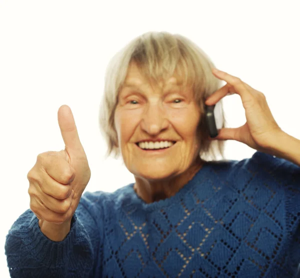 Smiling lady communicating through mobile phone — Stock Photo, Image