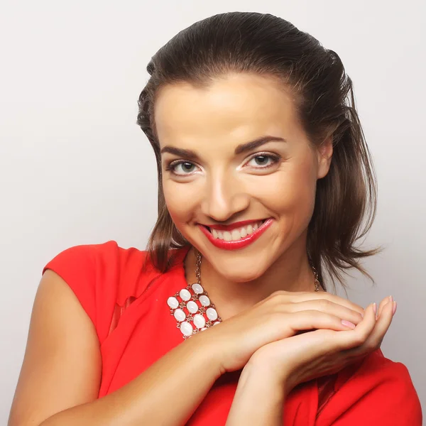 Young happy woman in red dress — Stock Photo, Image