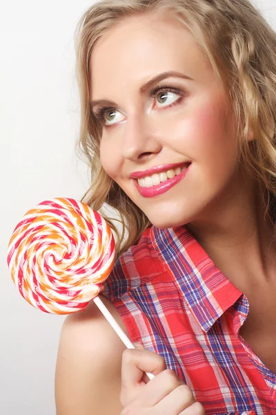 Jovem com lolipop — Fotografia de Stock