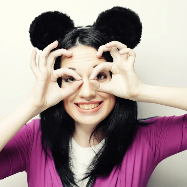 Surprised young woman with mouse ears — Stock Photo, Image