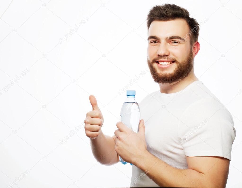 man with  bottle of water