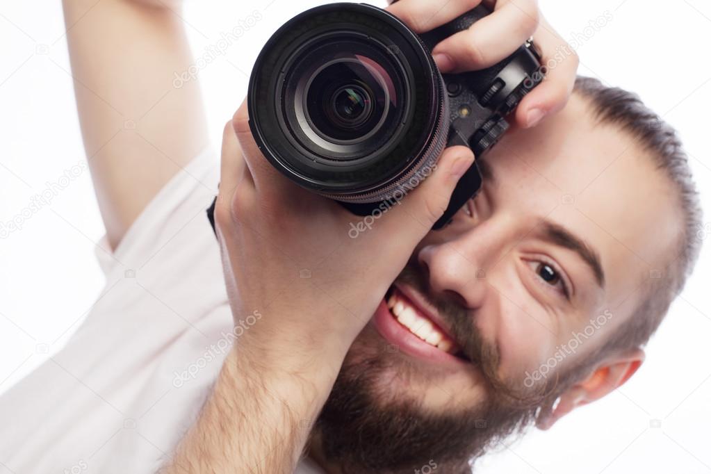 Young bearded  photographer