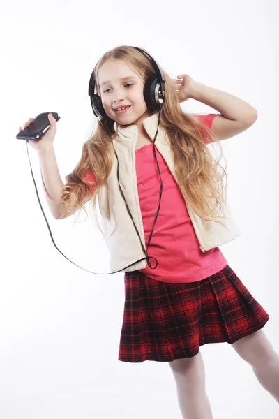 Dancing little girl headphones music — Stock Photo, Image