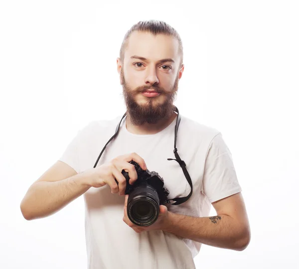 Bearded man with a digital camera — Stock Photo, Image