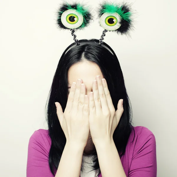 Surprised woman with funny green eyes. — Stock Photo, Image