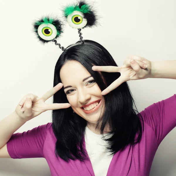 Mujer con ojos verdes divertidos —  Fotos de Stock