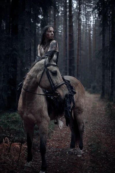 Young man with  horse — Stock Photo, Image